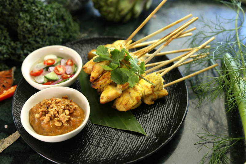 Chicken Satay Swewers served with Peanut Sauce and a side Salad