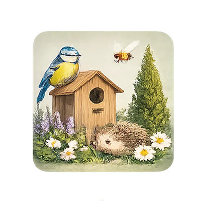 Wildlife-friendly trees supporting birds, bees and insects with bird box and hedgehog