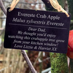 personalised metal tree tag showing the tree name and message